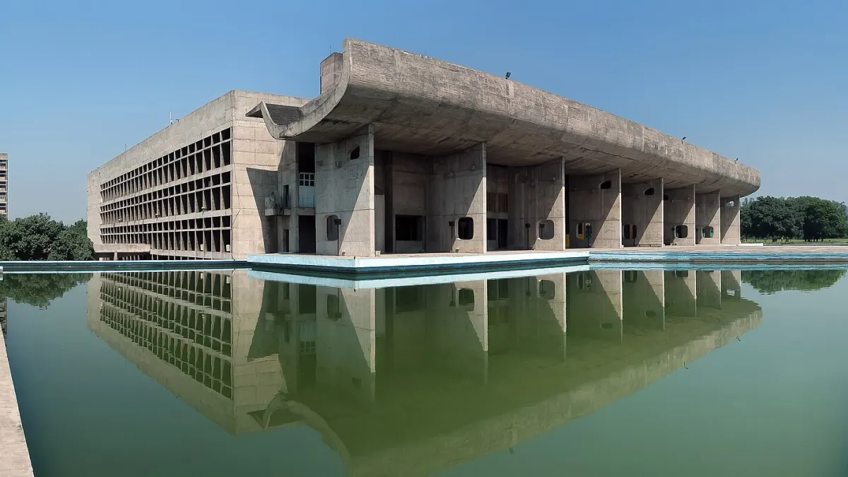 The modernist concrete buildings of the Capitol Complex in Chandigarh under a clear sky