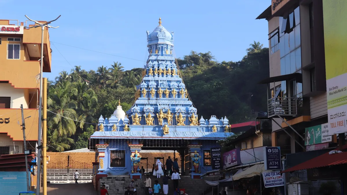 The Kadri Manjunath Temple in Mangalore set against a green hillside