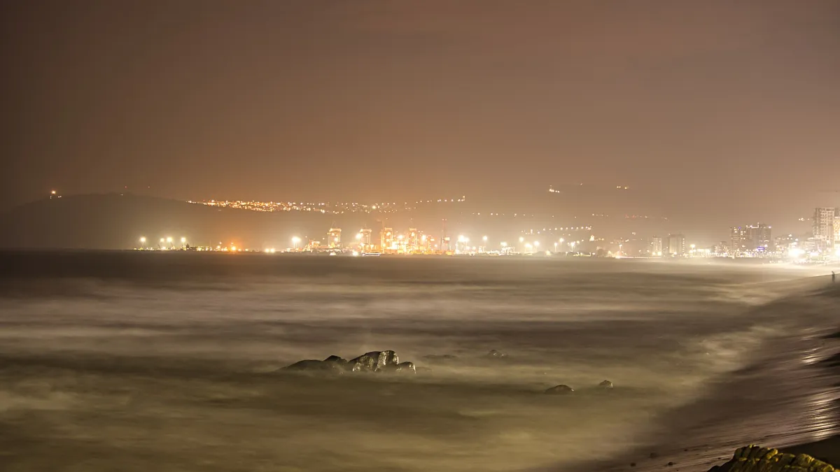 Ramakrishna Beach in Visakhapatnam with the beach road and city buildings along the shore